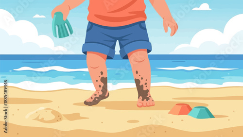 Child with muddy legs stands on sandy beach holding toy spade near ocean waves