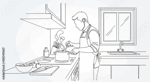 Man Cooking in Kitchen Wearing Apron.