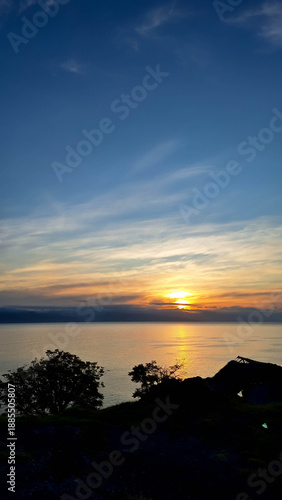 a dramatic and scenic view of the sky as the sun rises over the sea