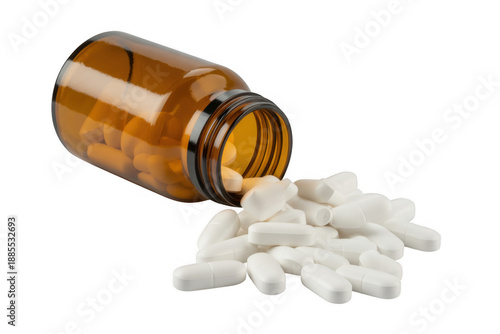 White pills spilling from a brown bottle medication isolated on a transparent background