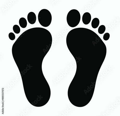 A pair of black footprints or bare feet on a white background, featuring simple silhouette style for signage, health, or path design use.