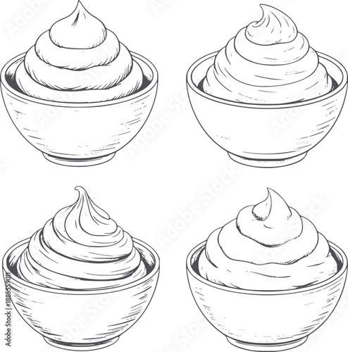 Four bowls with whipped cream swirls in pencil dessert