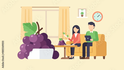Couple relaxing at home with a large bowl of grapes and small bunch on table