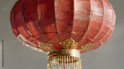 Red and gold   chinese lantern hanging from ceiling, traditional asian decoration for festive celebration and cultural holiday atmosphere in interior