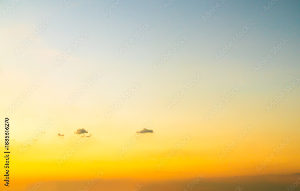 Fototapeta premium Sky sunset evening sunrise cloud weather dramatic landscape goldent and indigo color gradient pastel horizon, twilight yellow golden reflection morning nature environment energy ecosystem change