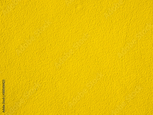 Foto Yellow background wall cement plaster concrete rough stucco construction