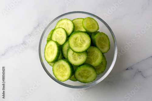 Fresh cucumber slices in bowl