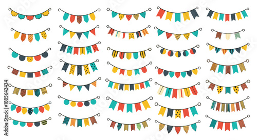 Large collection of colorful party buntings and flag garlands in various shapes and patterns for festive decorations.