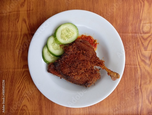 Fried Duck with Cucumber Slices and Chilli Sauce