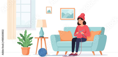 Cozy indoor scene of a woman in a red hat knitting on a teal sofa