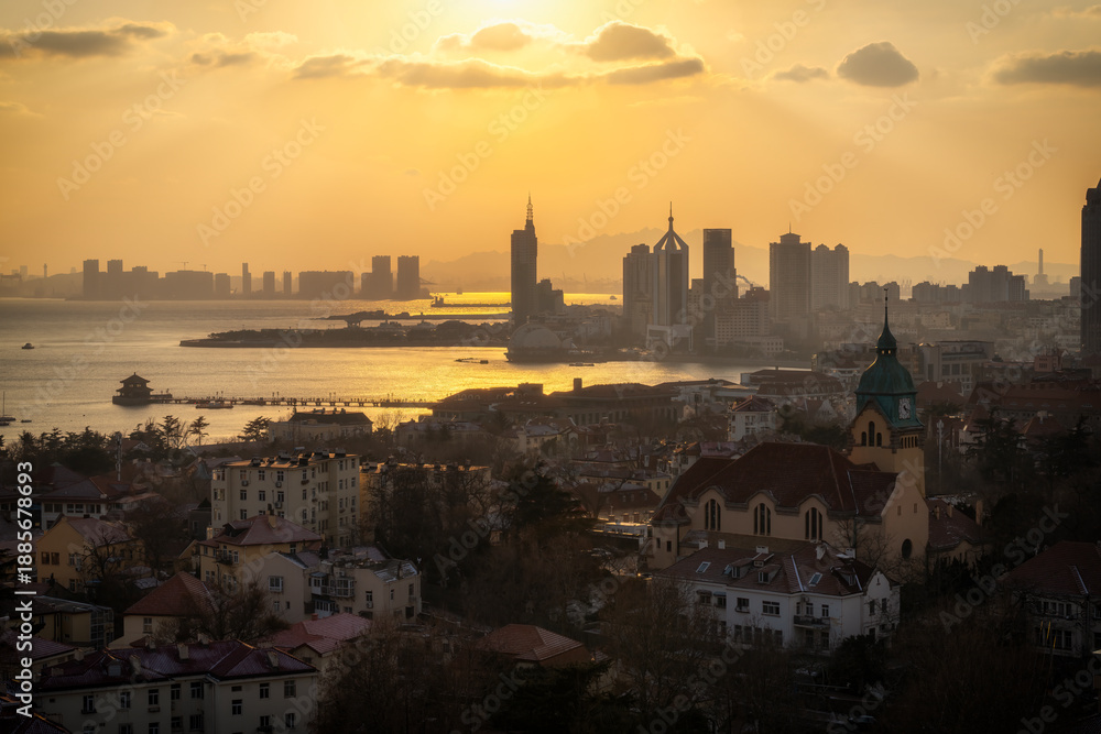 Fototapeta premium Qingdao, China: city skyline, architecture, landscape, city, metropolis, landmark, background, tourist destination, downtown, modern.