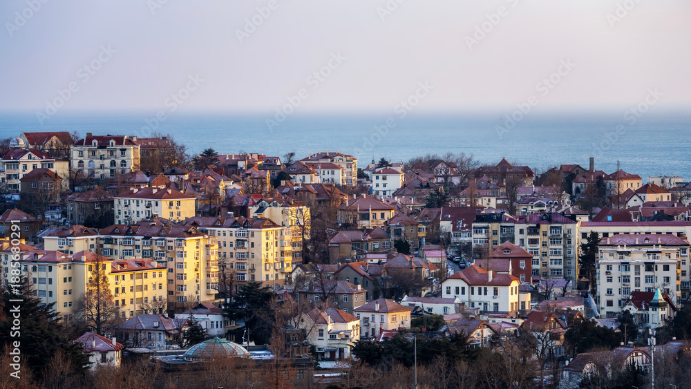Fototapeta premium Qingdao, China: city skyline, architecture, landscape, city, metropolis, landmark, background, tourist destination, downtown, modern.