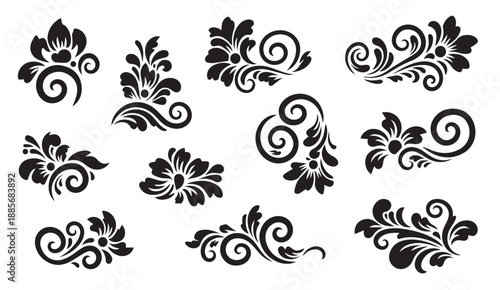 Set of black floral swirl designs and ornate scrolls on white background
