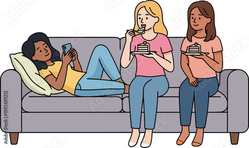 Three women relaxing on a gray couch, using various electronic devices together in a casual setting