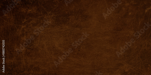 Blank vintage parchment with an aged brown grunge texture provides a stained antique paper background for a retro pattern design or ancient wall backdrop surface