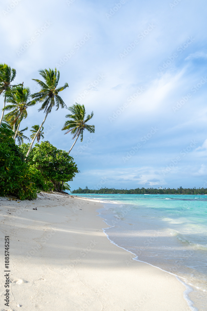 Fototapeta premium Anini Marae Beach on Huahine, French Polynesia, with turquoise waters