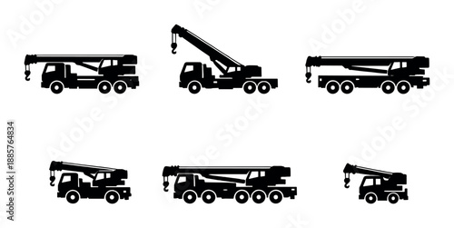 Silhouetted construction vehicles: crane trucks with boom arms in various positions on gray background