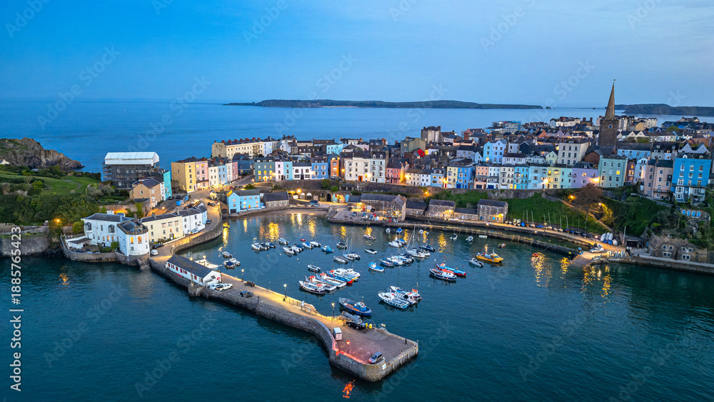 Fototapeta premium Tenby Harbour at blue hour with harbour lights, Pembrokeshire, Wales