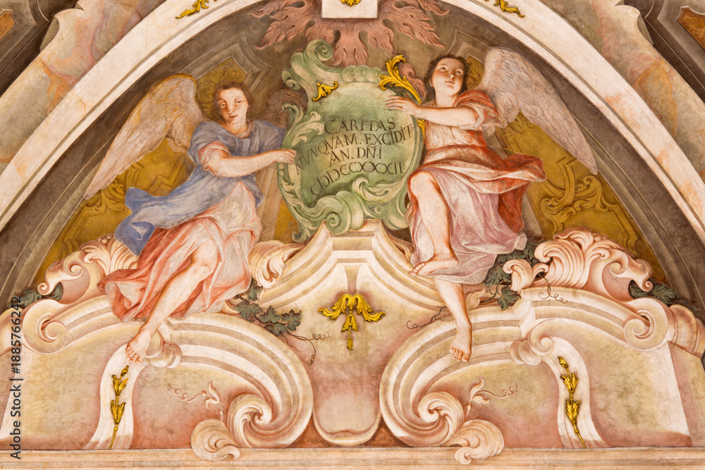 Naklejka premium Brescia - The fresco of angels as the symbol of cardinal virtue of Love in Chiesa di Santa Maria della Carita by Ferdinando Cairo and Luigi Vernazal from 18. cent.