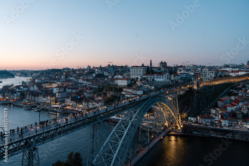 Dom luís i bridge connecting porto and gaia at twilight