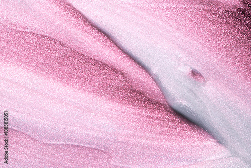 Fotografie Abstract pink shimmering cosmetic texture background