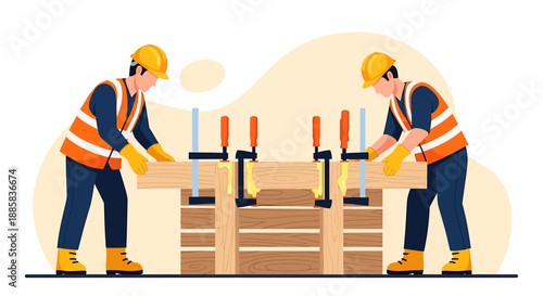 Two construction workers in hard hats and safety vests assembling wood planks with clamps.