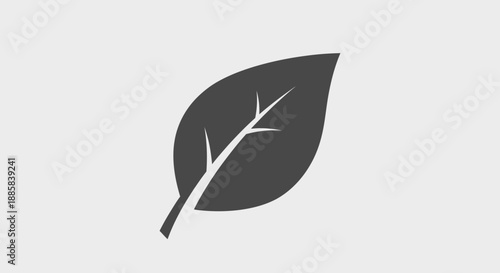Simple Dark Gray Leaf Icon on Light Gray Background.