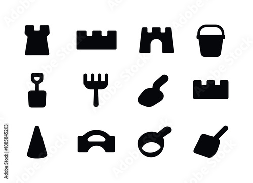 Beach Toy Icons. Beach construction set. Solid icon set of Beach construction set: sandcastle tower mold, wall mold, gate mold, bucket, shovel, rake, smoothing