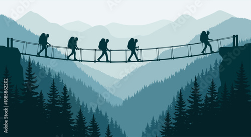 Five hikers crossing a suspension bridge over a valley of pine trees and mountains on a misty day