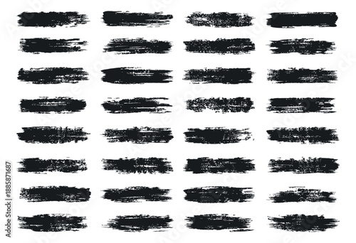 Grunge hand drawn brush strokes set featuring various black paint textures for graphic design and artistic projects