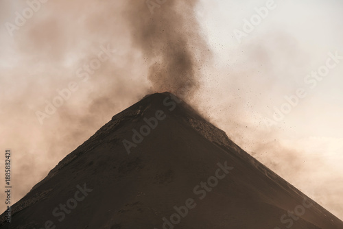 Volcano Eruption with Ash Plume at Sunset