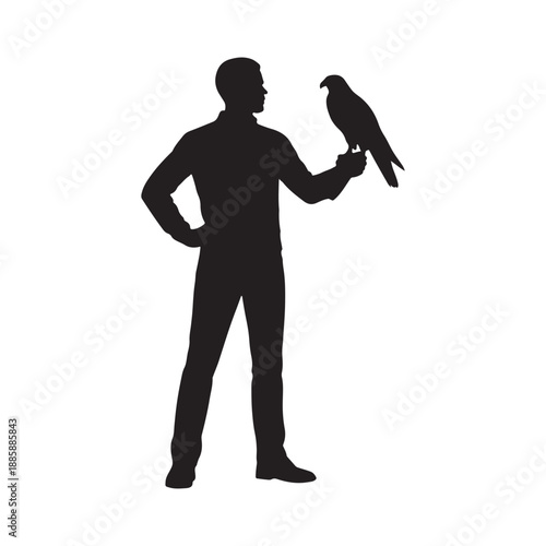 Silhouette of man with falcon 