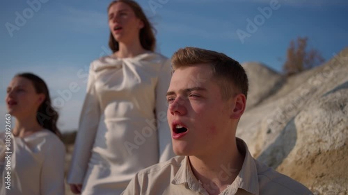 Wallpaper Mural People singing a song in a rocky landscape. Concept of young singers. Torontodigital.ca