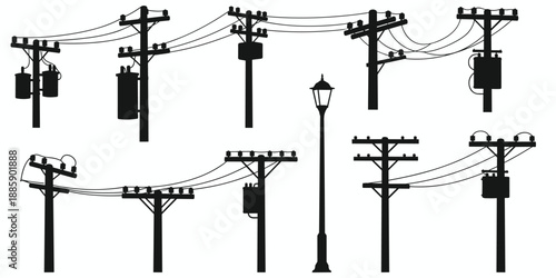 Silhouettes of electricity poles with transformers and wires and a lamppost power line utility pole