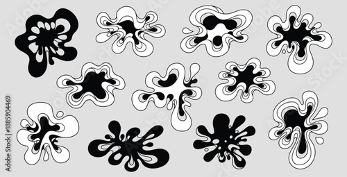 Collection of abstract black and white liquid splash ink blot shapes in a stylized organic pattern for modern graphic design elements
