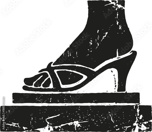 Female foot wearing strappy block heel sandal standing on a textured surface