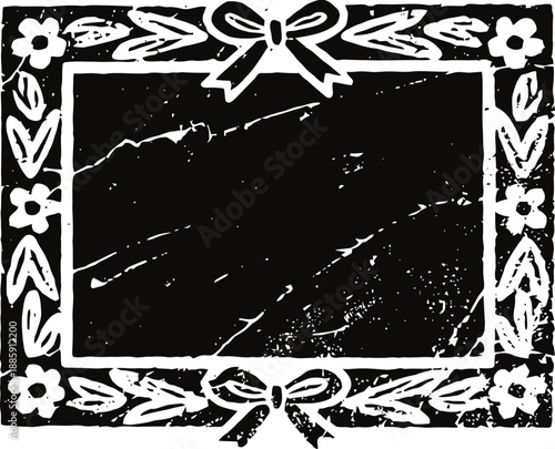 Vintage ornate frame with floral and ribbon borders in black and white distressed
