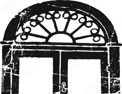 Old arched door with decorative fanlight window and weathered rustic texture