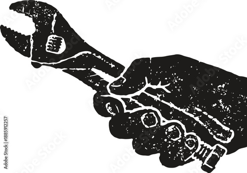Hand holding adjustable wrench tool for repair and maintenance work silhouette