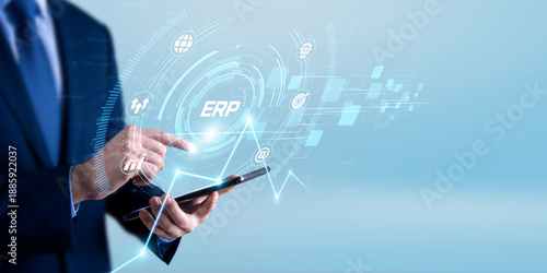 Billede på lærred ERP consultant using the tablet and analyzing enterprise resource planning data
