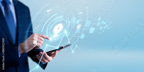 Tablou pe pânză Business professional using the tablet and analyzing time management data