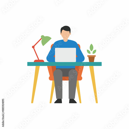 Man working on laptop at modern home office desk