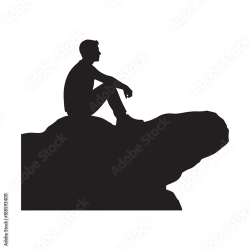Silhouette of a man sitting on a rocky cliff edge 
