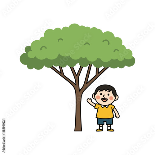 Boy happily standing next to a large green tree outdoors  