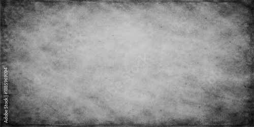 Vintage dark gray grunge paper texture background with a dirty smoke pattern and light fog on an old textured surface