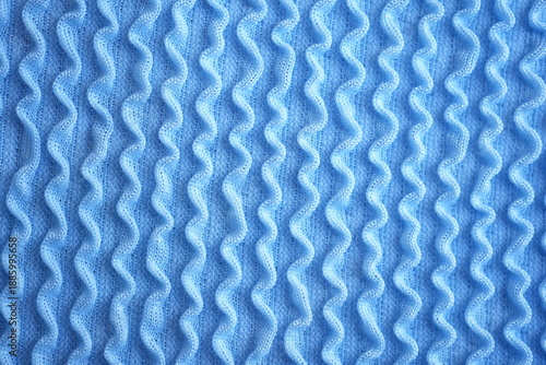 Photos Blue swimwear fabric texture background Close-up texture of blue elastic swimwear fabric with wavy pattern