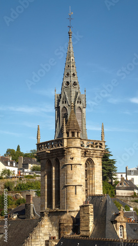 Gothic church tower with detailed architecture rising into the sky.