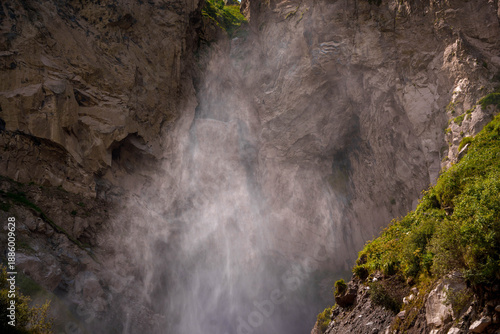 Main building of Moscow State University at sunset.Iconic main building of Moscow State University with spire, captured at sunset. Historical 