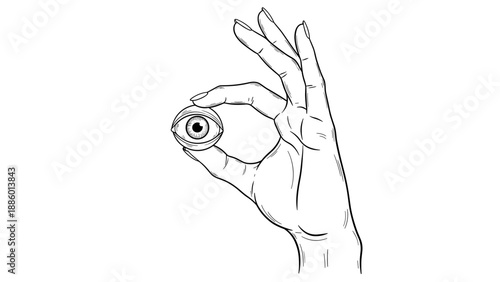 Hand holding a realistic eyeball with fingers delicately.