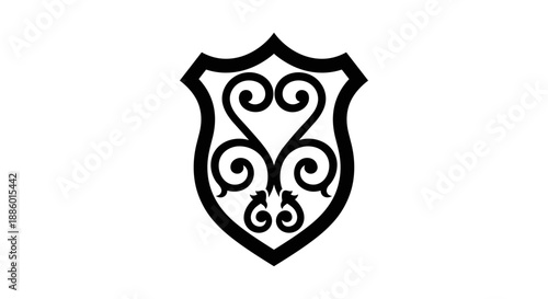 Elegant Black Shield Emblem with Ornate Swirls and Flourishes.